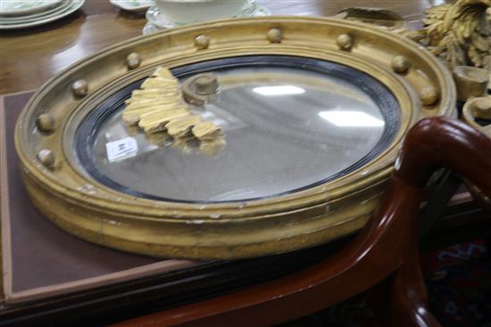 A Regency style convex wall mirror, H.2ft 9in.